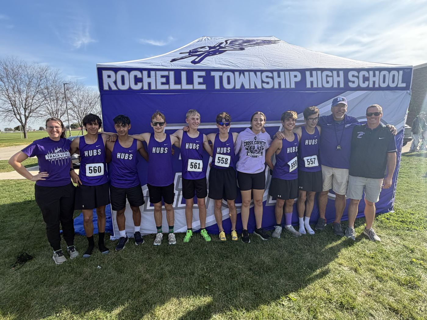 The Rochelle Hubs regional team and coaches in front of the RTHS tent at Belvidere